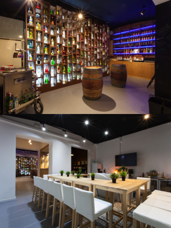 Dos ambientes de la cuidada y completa Cocktail Shop